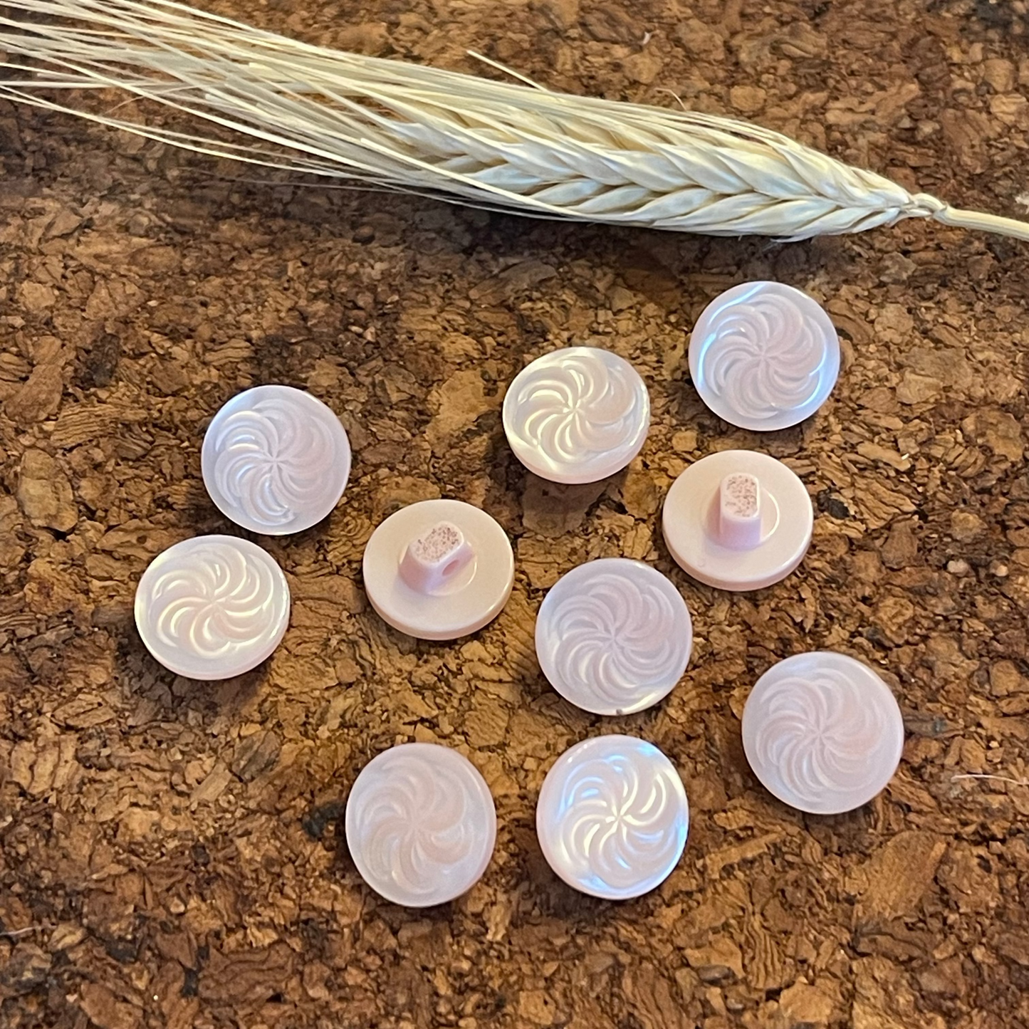 Bouton rond spirales rose clair 12mm