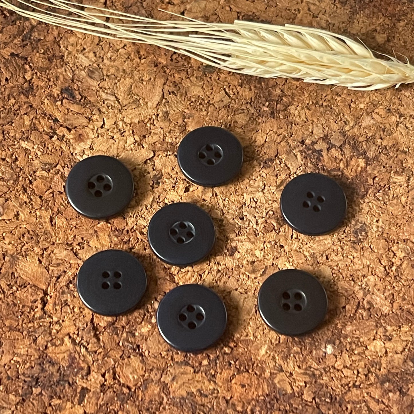 Bouton rond noir incurvé 15mm