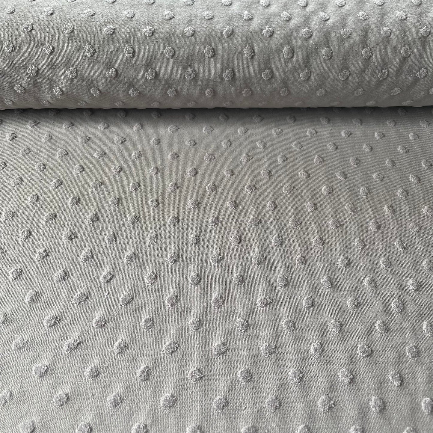 Jersey plumetis gris