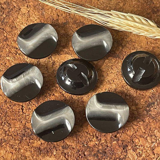 Bouton rond noir avec relief blanc 27mm