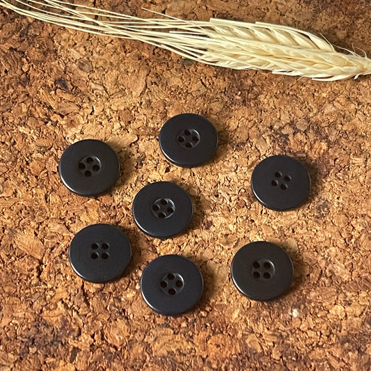 Bouton rond noir incurvé 15mm