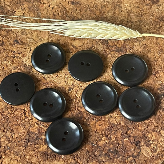 Bouton rond noir incurvé 22mm