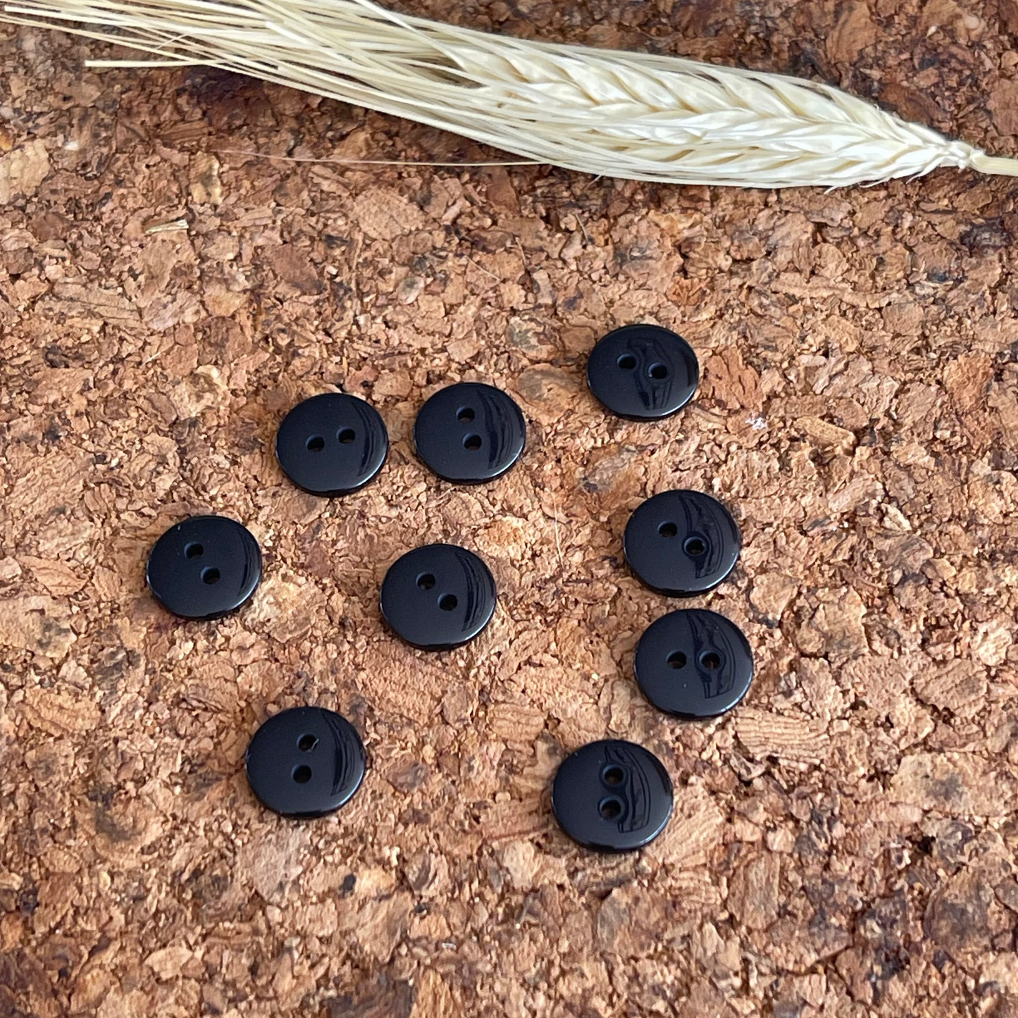 Bouton rond noir 11mm 2 trous