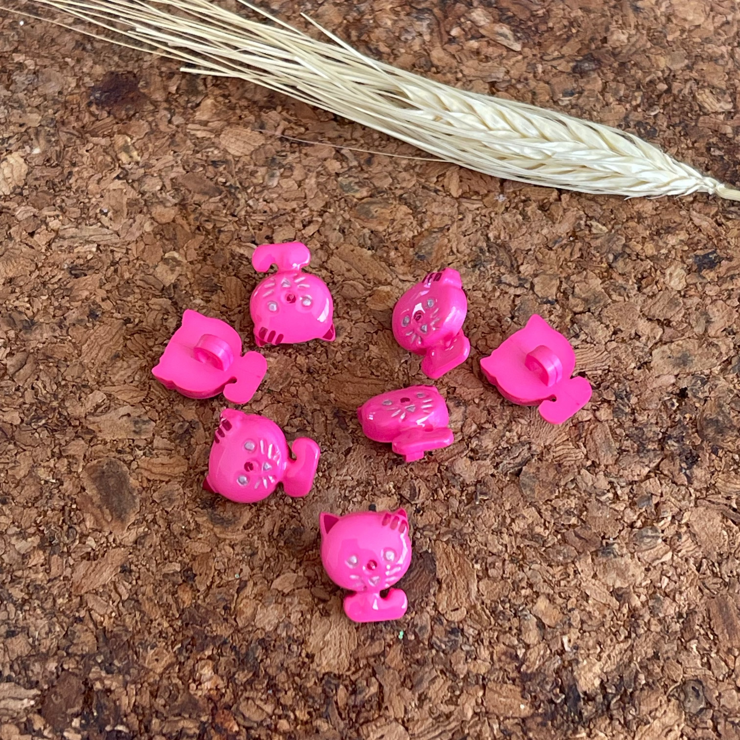 Bouton chat rose fuchsia pvc - 18 mm