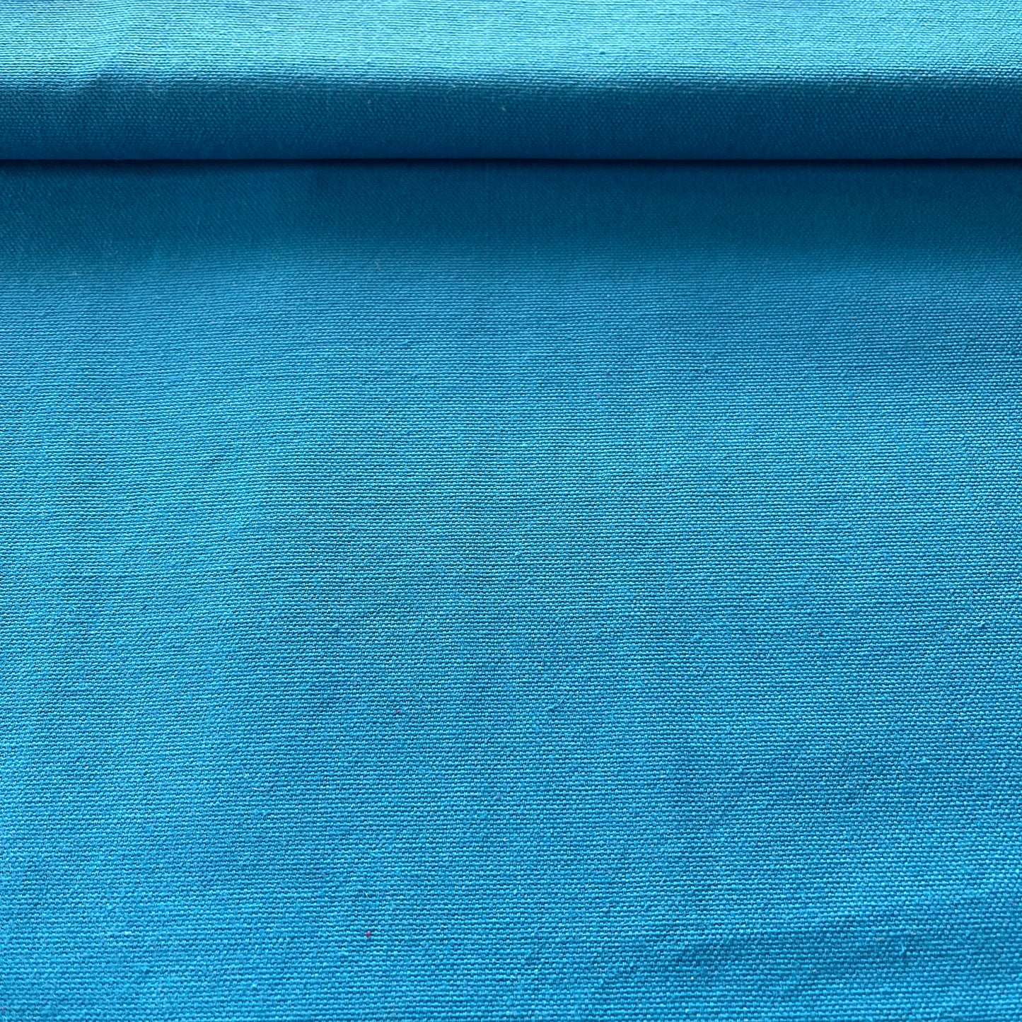 Toile de coton bleu uni épais