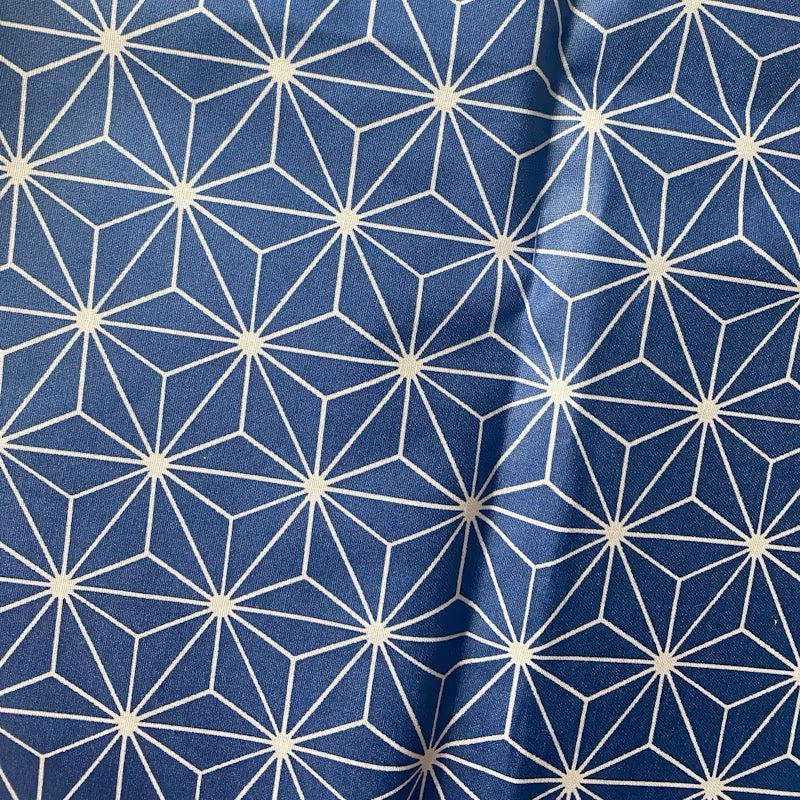 Coton enduit géométrique bleu