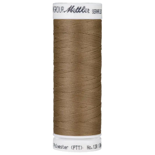 Fil à coudre élastique Seraflex Mettler 130 m - 387 beige foncé